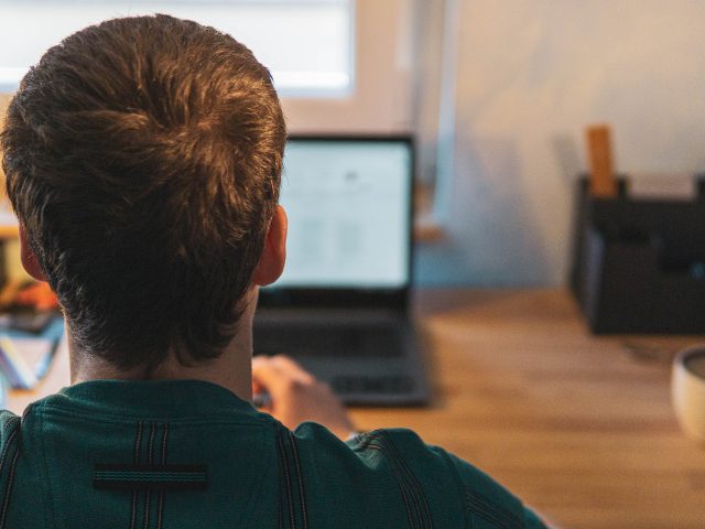businessman-using-laptop-office